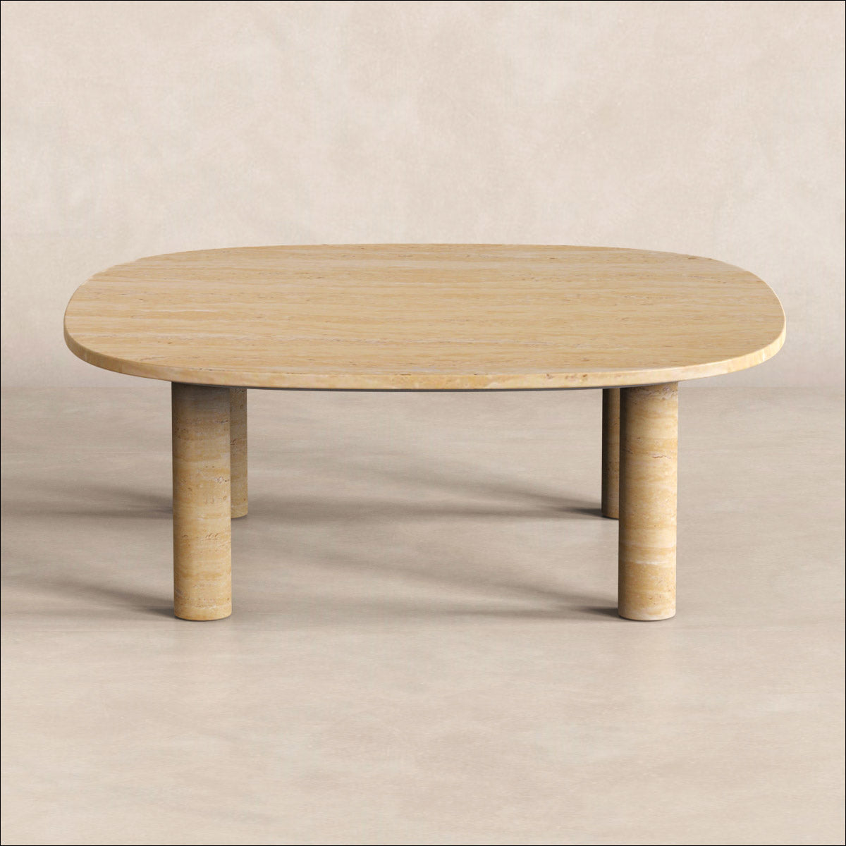 SquareSoft beige travertine coffee table with rounded corners and cylindrical legs in a neutral setting.