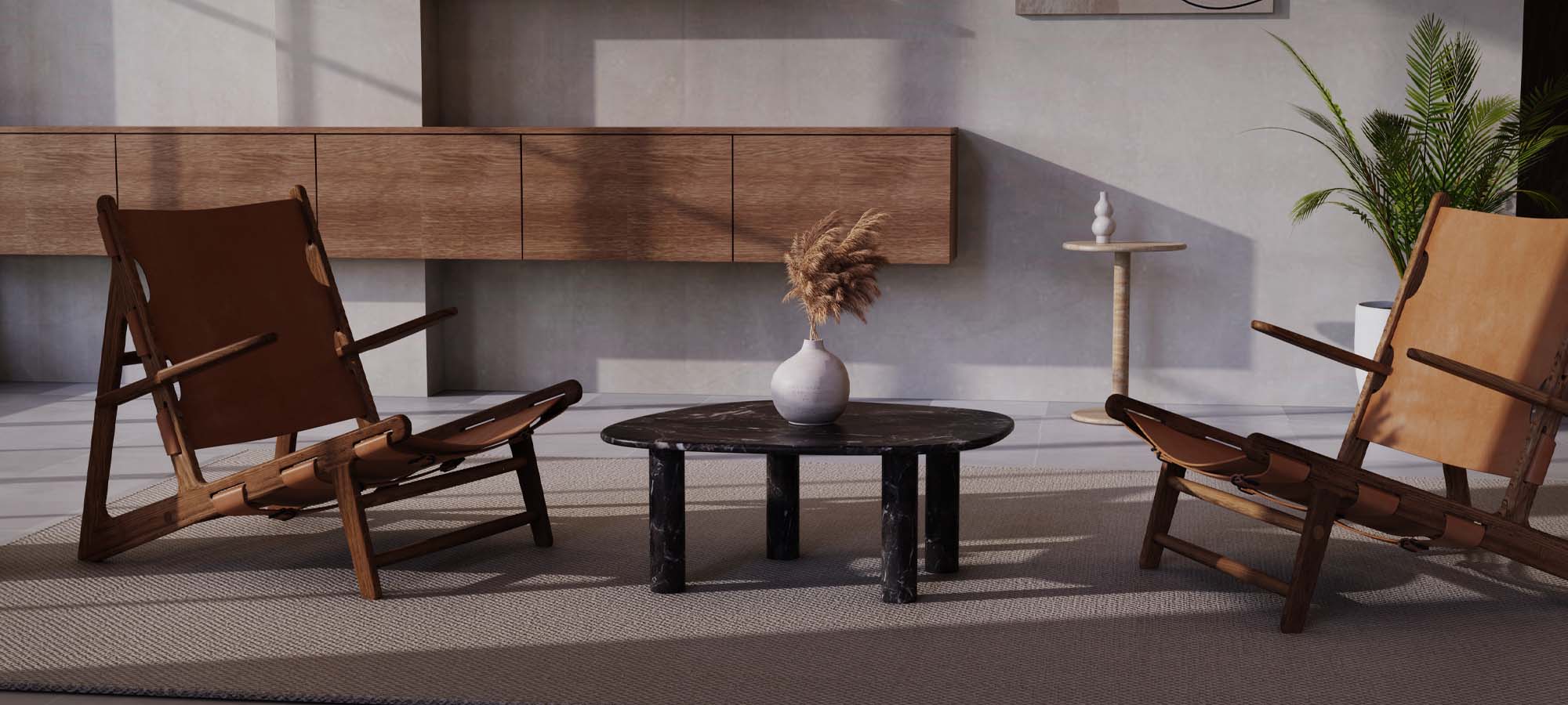 ZenPebble marble and travertine tables styled in a refined modern interior