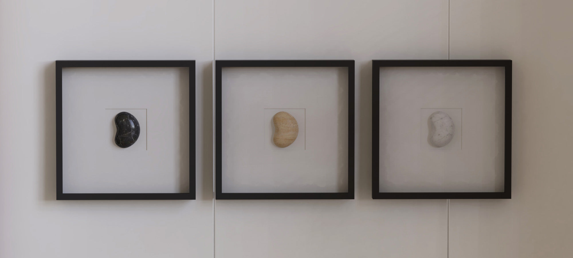 Marble and natural stone wall decor displayed in a refined modern interior