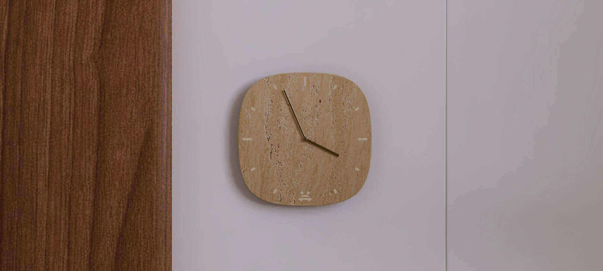 Marble and natural stone wall clock displayed in a refined modern interior