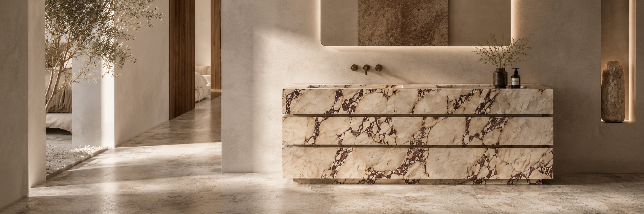 Marble bathroom vanity with integrated sink and drawers in a refined bath interior
