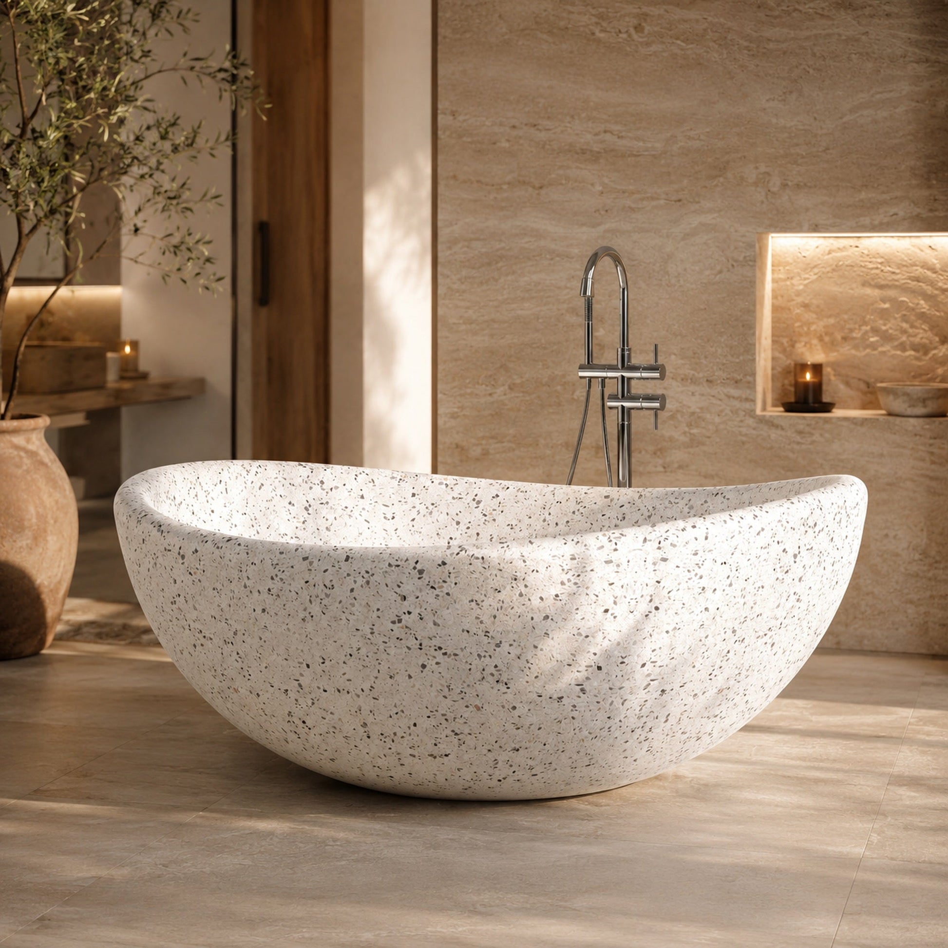 Lunara Alba White Terrazzo round freestanding soaking bathtub in a warm sunlit luxury bathroom, hero scene