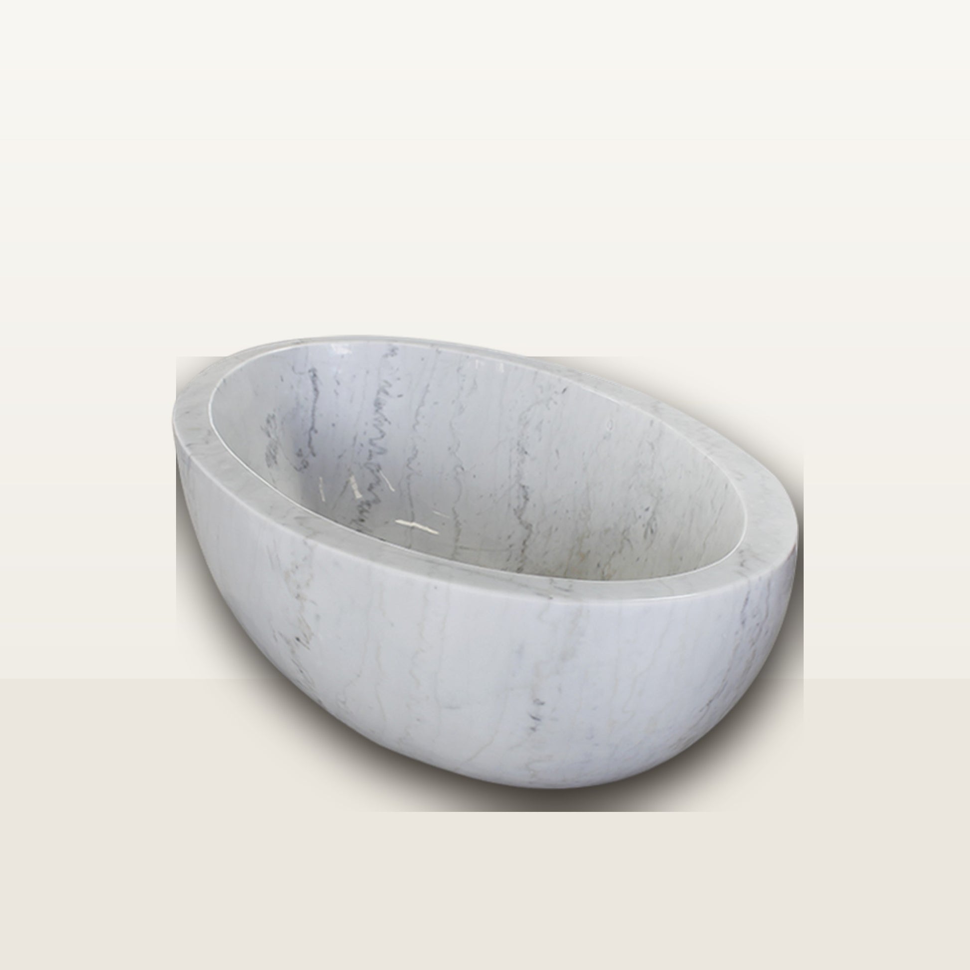 Mira freestanding Ivory Cloud Marble deep oval soaking bathtub, clean studio view