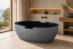 Noctira Absolute Black Granite soaking bathtub in a warm luxury bathroom, styled visualization