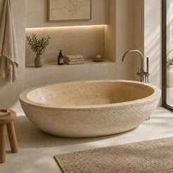 YARA Beige Travertine freestanding soaking bathtub with a smooth basin and chiseled exterior, studio visualization
