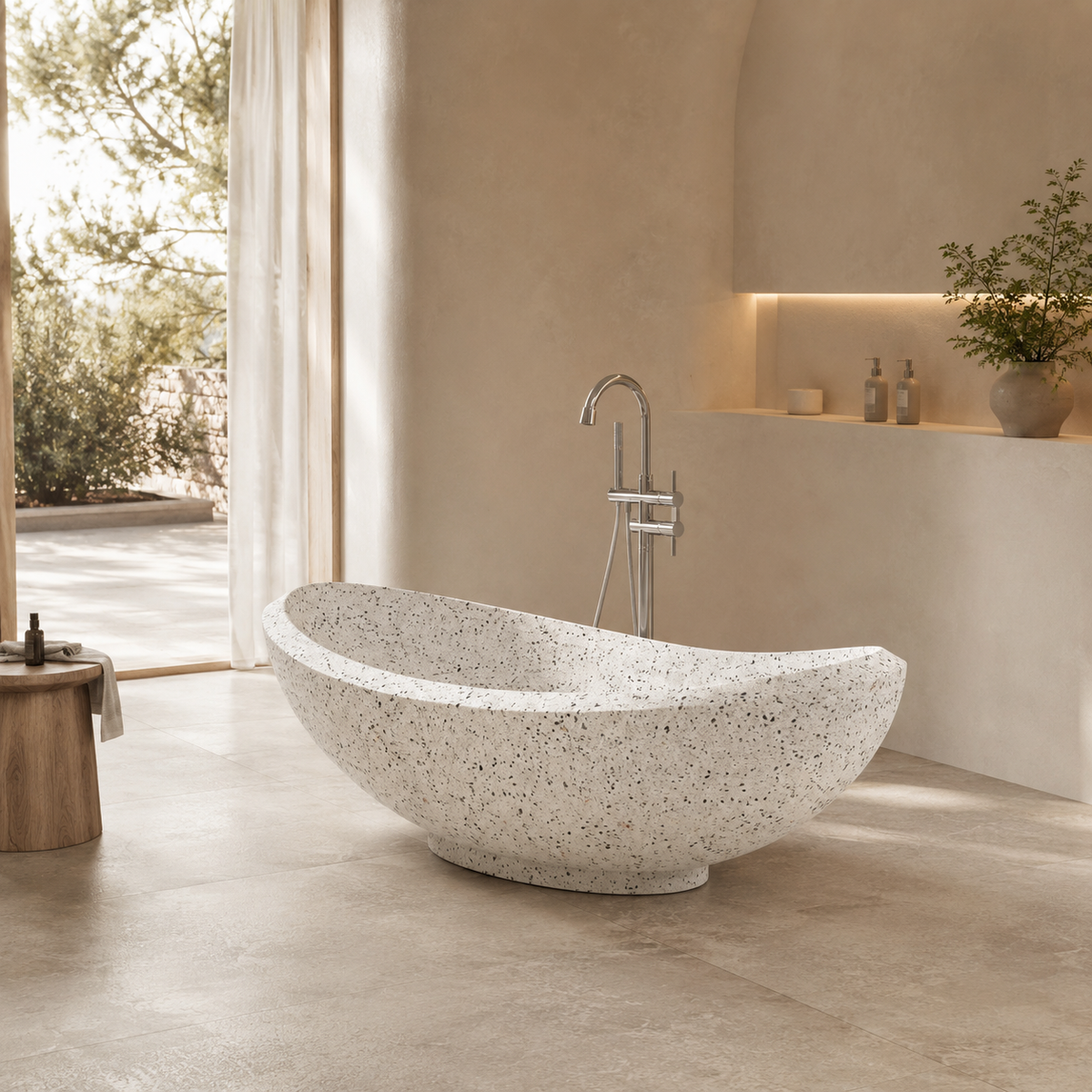 Yuna BT-032A alba-white-terrazzo freestanding soaking bathtub in a warm neutral architectural bathroom, hero lifestyle view