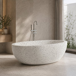 Aveline Alba White Terrazzo freestanding soaking bathtub in a serene modern spa bathroom, second lifestyle scene