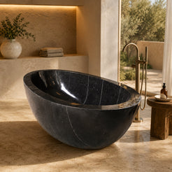 Aveline Portoro Black Marble freestanding soaking bathtub in a serene architectural bathroom, second lifestyle scene