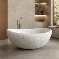 Lunara Alba White Terrazzo round freestanding soaking bathtub in a calm minimalist spa bathroom, second lifestyle scene