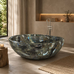 Lunara Celestia Blue Quartzite round freestanding soaking bathtub in a softly lit modern spa bathroom, second lifestyle scene