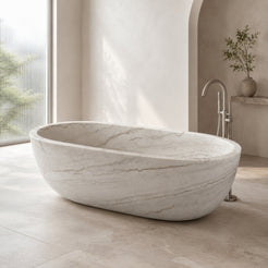 Serena Ivory Cloud Marble freestanding bathtub in a bright architectural bathroom, styled visualization