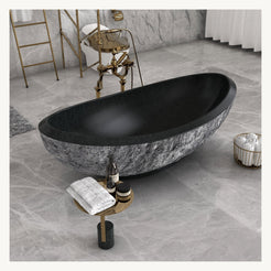Yura boat-shaped Neroco Granite freestanding soaking bathtub in a styled bathroom setting