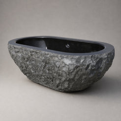 Arden Natural-Face Black Granite freestanding bathtub, three-quarter studio visualization