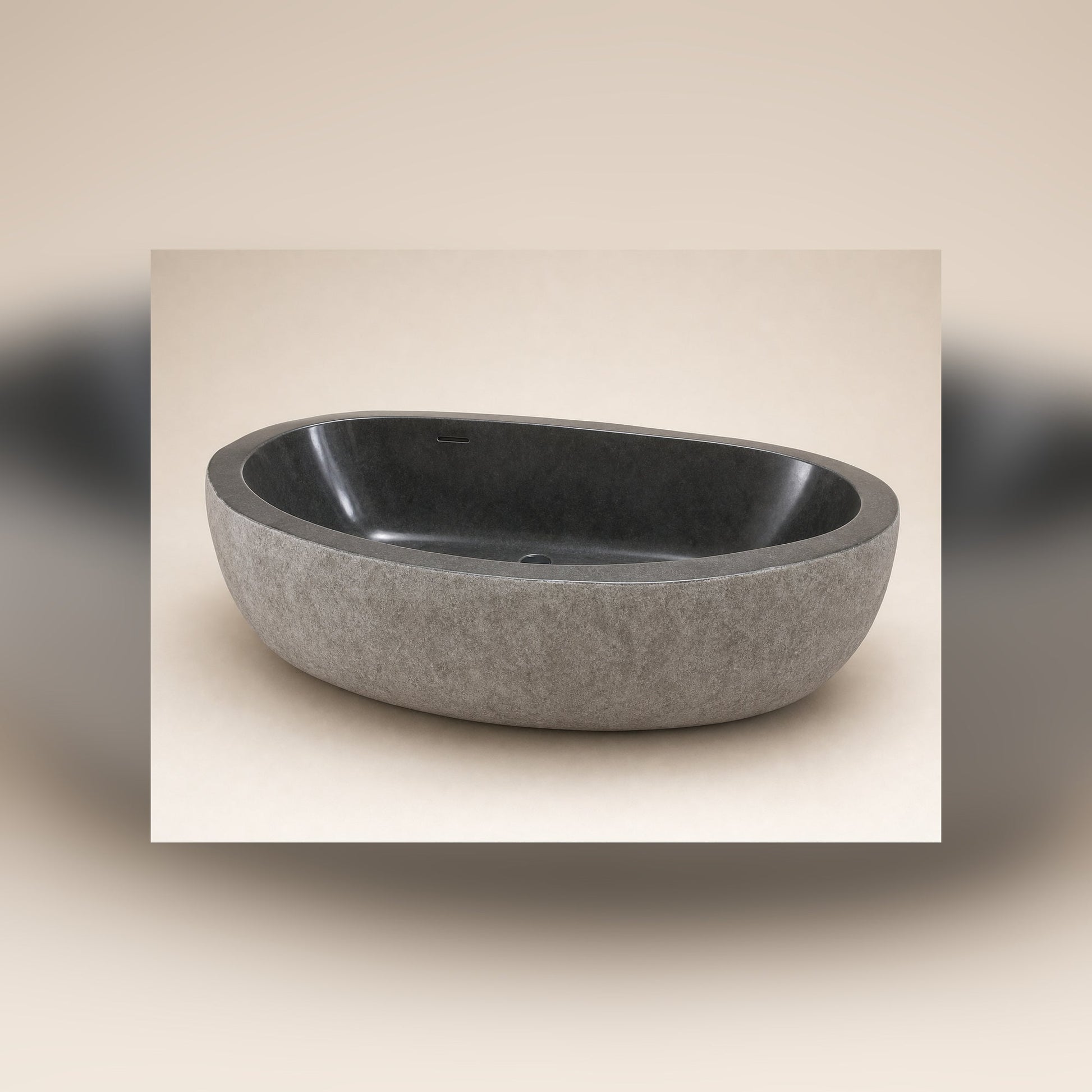 Cavira Charcoal Mist Granite freestanding bathtub, premium three-quarter studio view
