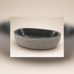 Cavira Charcoal Mist Granite freestanding bathtub, premium three-quarter studio view