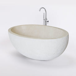 Evania Crema Marfil Extra Marble bathtub with hand-chiseled exterior and polished interior, studio three-quarter visualization