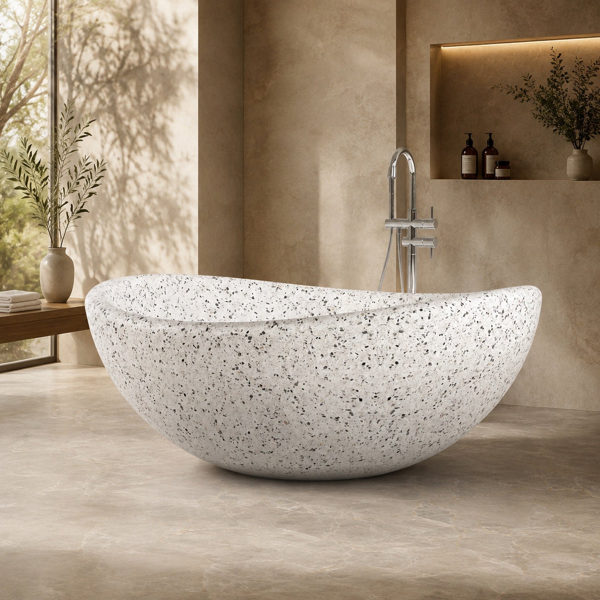 Lunara Alba White Terrazzo round freestanding soaking bathtub in a softly lit luxury spa bathroom, third lifestyle scene
