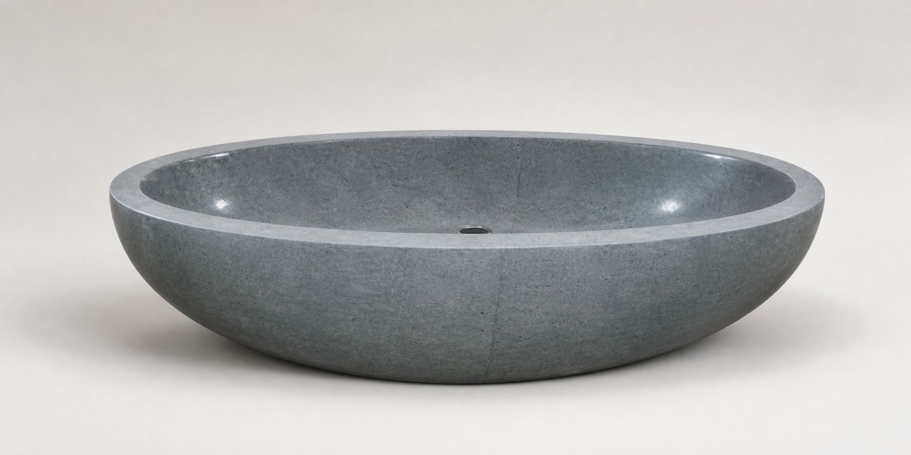Nerida low oval Natural Blue-Gray Granite bathtub, premium studio visualization