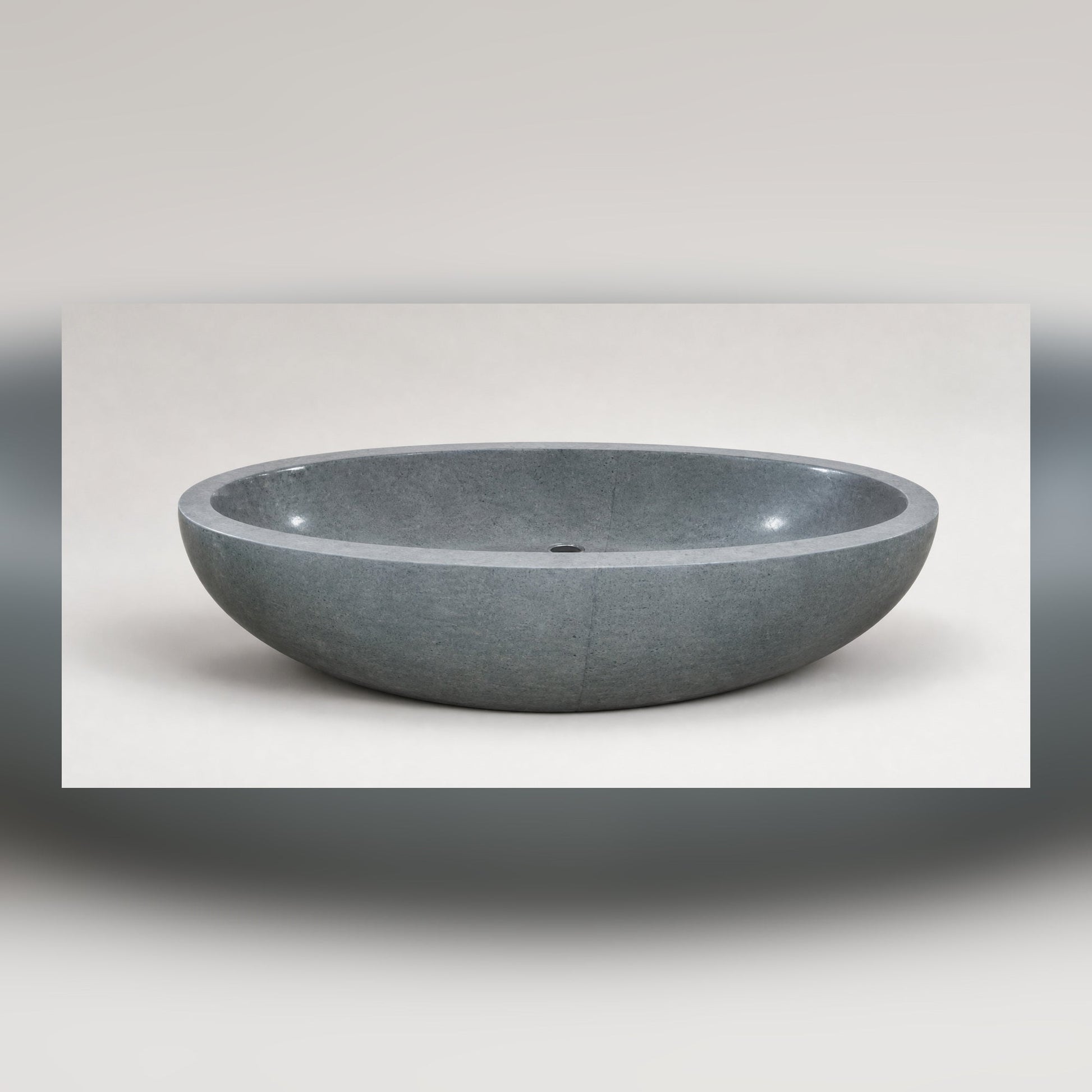Nerida Blue-Gray Granite freestanding bathtub, three-quarter studio visualization