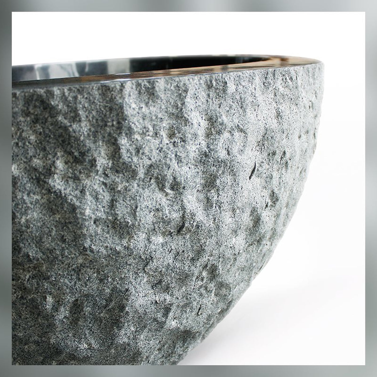 Noctelle BT-167A Absolute Black Granite bush-hammer freestanding soaking bathtub, full-frame three-quarter view