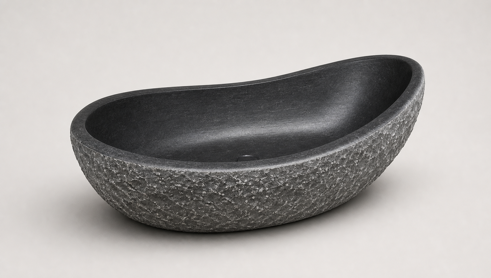 Noira Natural Black Granite bathtub with a raised curved rim, premium studio visualization