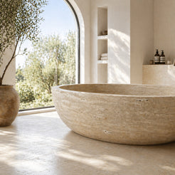 ROMA Roman Travertine soaking bathtub in a spa-inspired interior, styled visualization