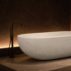 Serena Dune Ivory Limestone bathtub in a boutique hotel spa, styled visualization