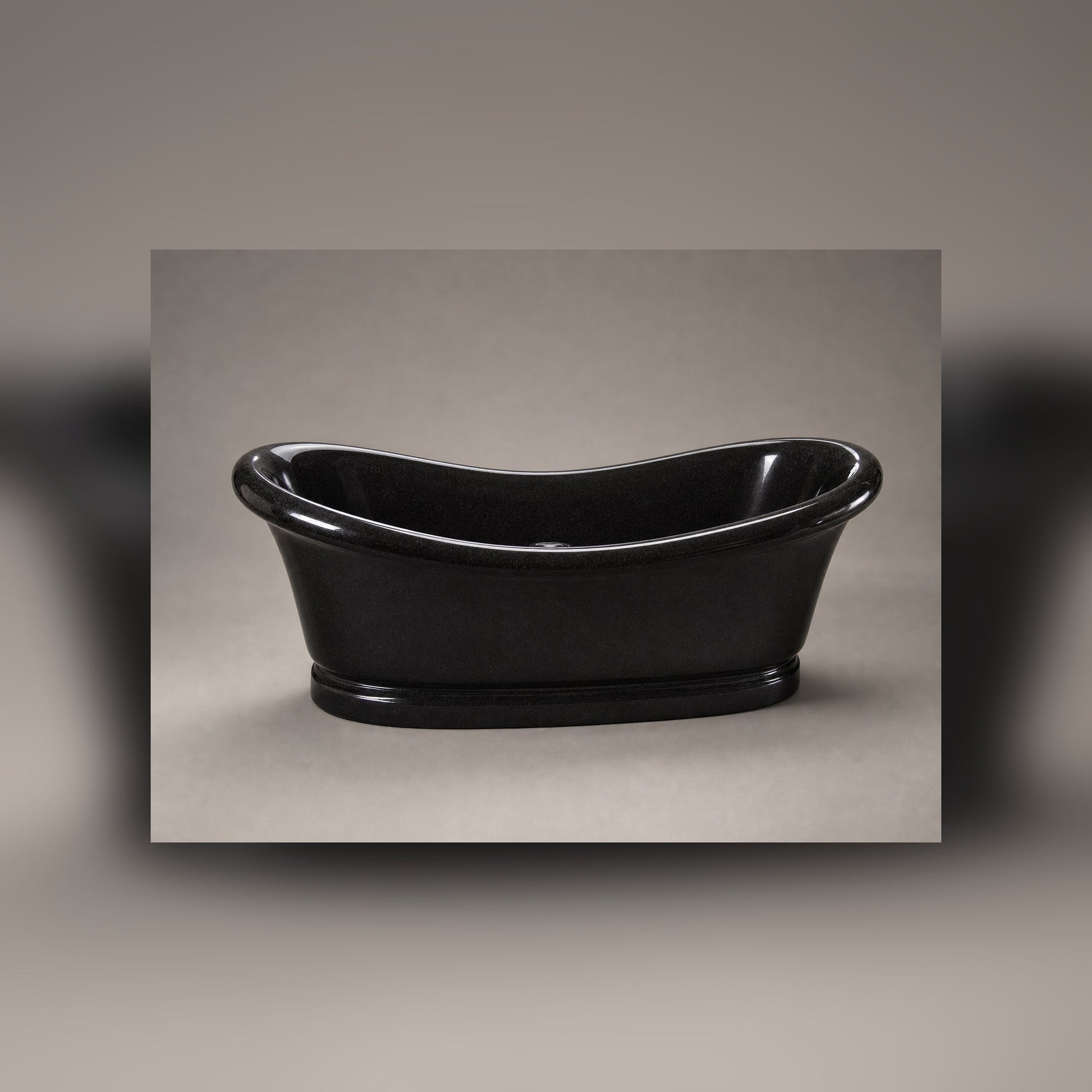 Vallora Absolute Black Granite freestanding bathtub, premium three-quarter studio view