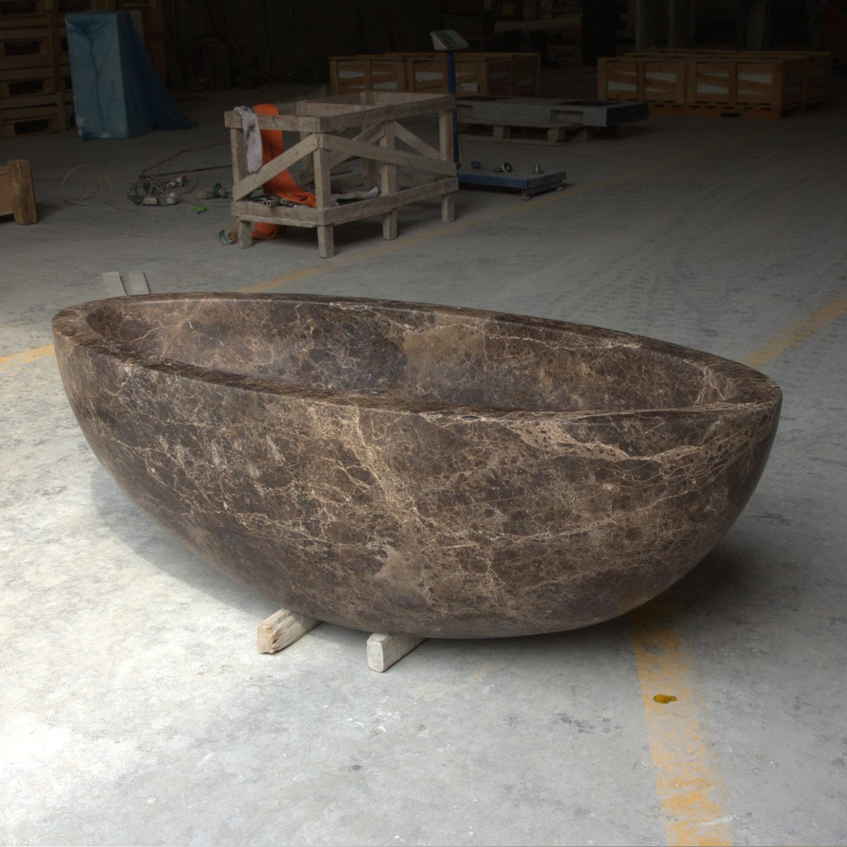Verelle Dark Emperador Marble sculptural oval bathtub, real product three-quarter view