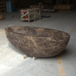 Verelle Dark Emperador Marble sculptural oval bathtub, real product three-quarter view