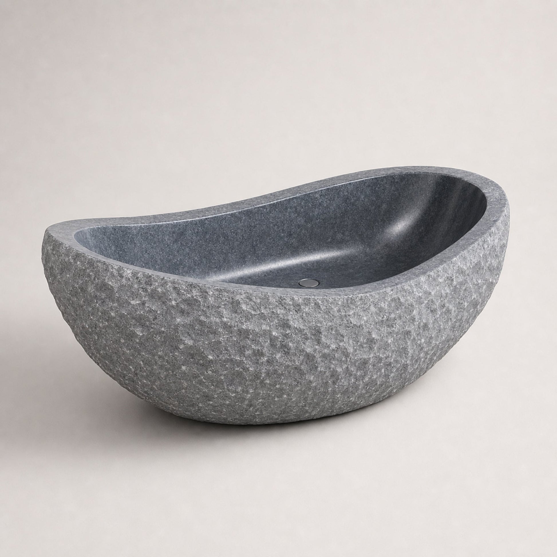 Veyra sculptural Charcoal Mist Granite freestanding bathtub, premium three-quarter studio view