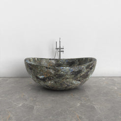 Lunara round freestanding Celestia Blue Quartzite soaking bathtub, front view
