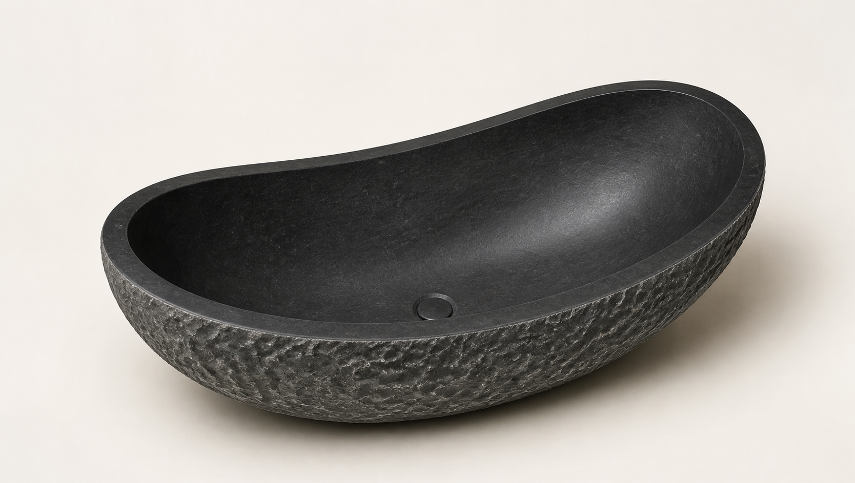 Noira black granite bathtub, elevated view of the polished interior and textured exterior