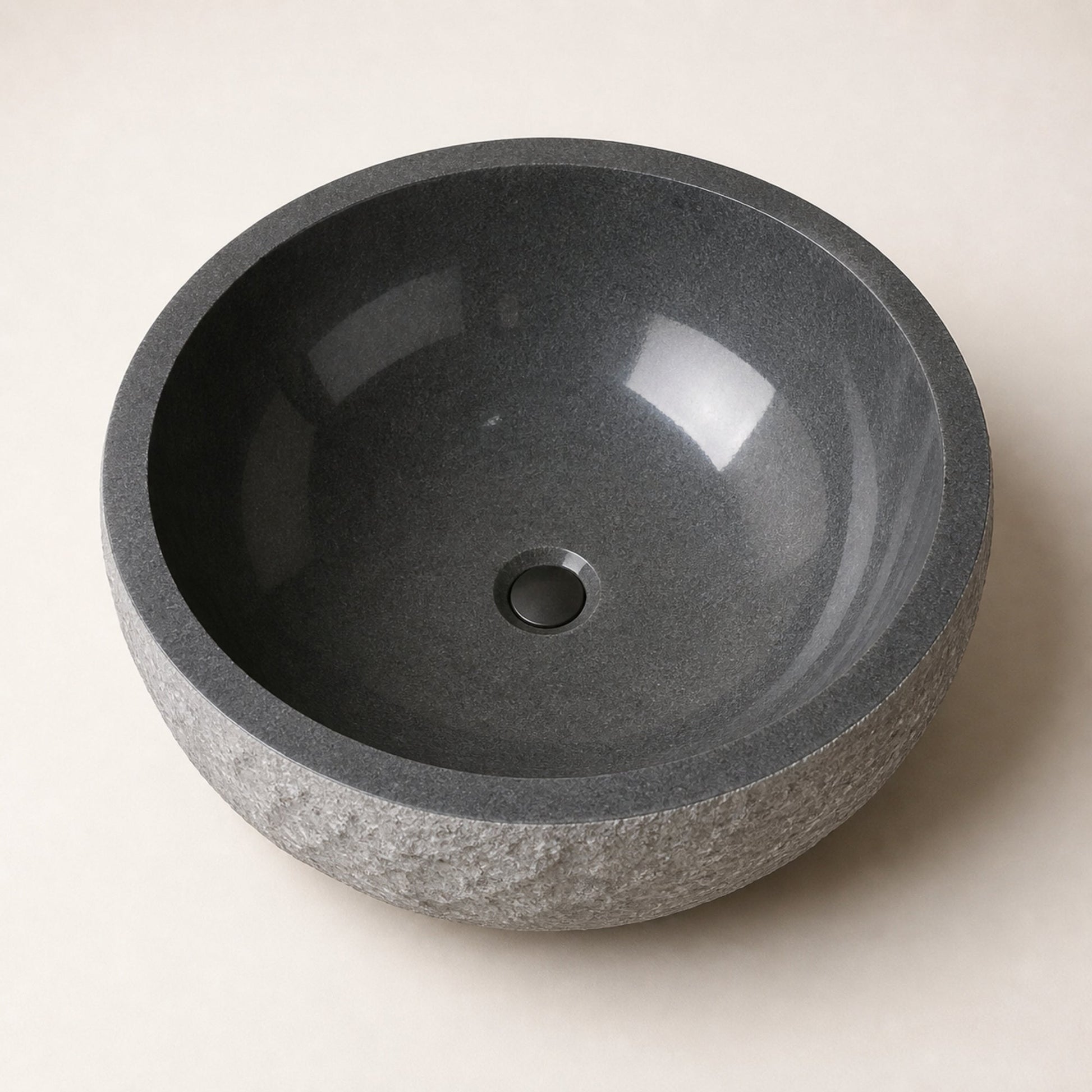 Oria round Charcoal Mist Granite bathtub, top interior view with drain