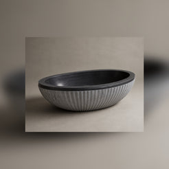 Rivelle fluted Midnight Black Granite freestanding bathtub, opposite-angle studio visualization