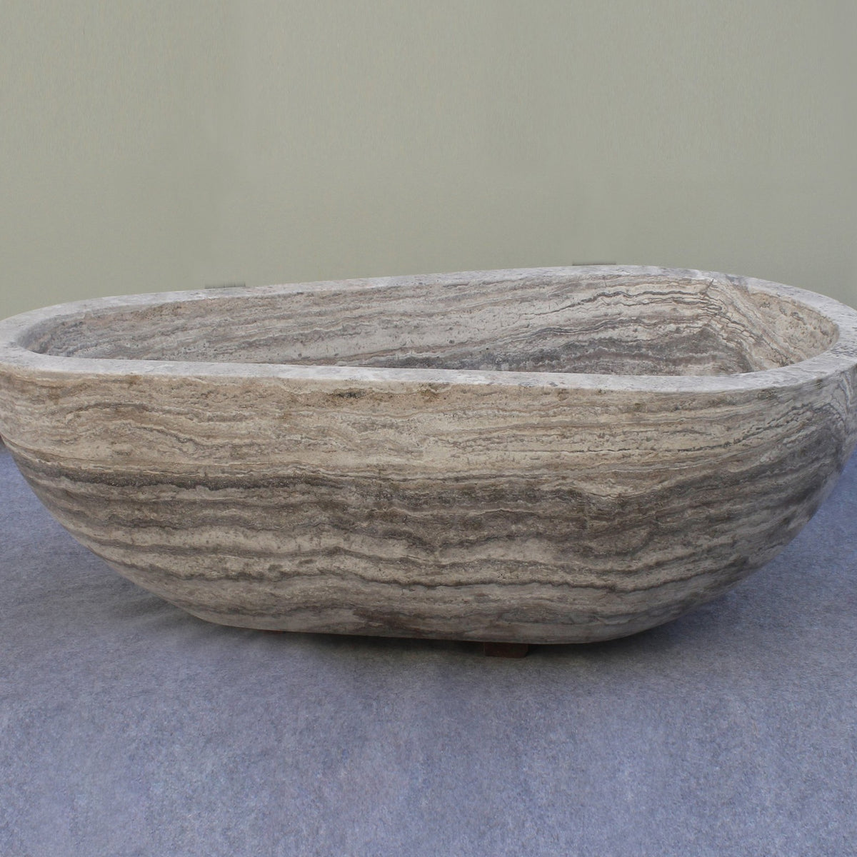 Rovena Roman Silver Travertine soaking bathtub, real product side-profile view
