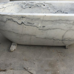Actual Serena BT-105A Ivory Cloud Marble bathtub, real polished rim and natural stone veining detail