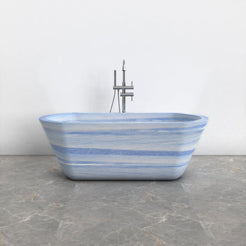 Tivelle Azura Blue Quartzite flared rounded-rectangle bathtub, studio front-view visualization