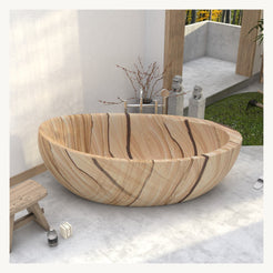 Yuka Natural Sandstone freestanding bathtub, opposite-angle styled visualization