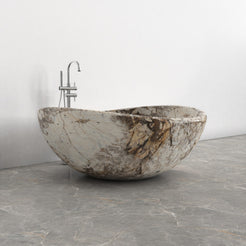 Lunara round freestanding Pandora Blanc Quartzite soaking bathtub, side view