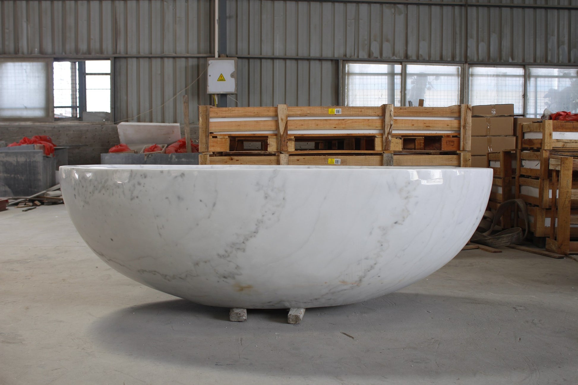 Actual Mira BT-031A solid marble bathtub photographed at the stone workshop, front view
