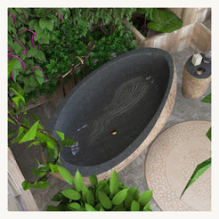 Yitta Filetto Cobble Stone Granite bathtub, top interior view with drain