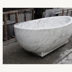 Celeste Ivory Cloud Marble soaking bathtub, real three-quarter workshop view