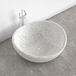 Lunara round freestanding Alba White Terrazzo soaking bathtub, top interior and drain view