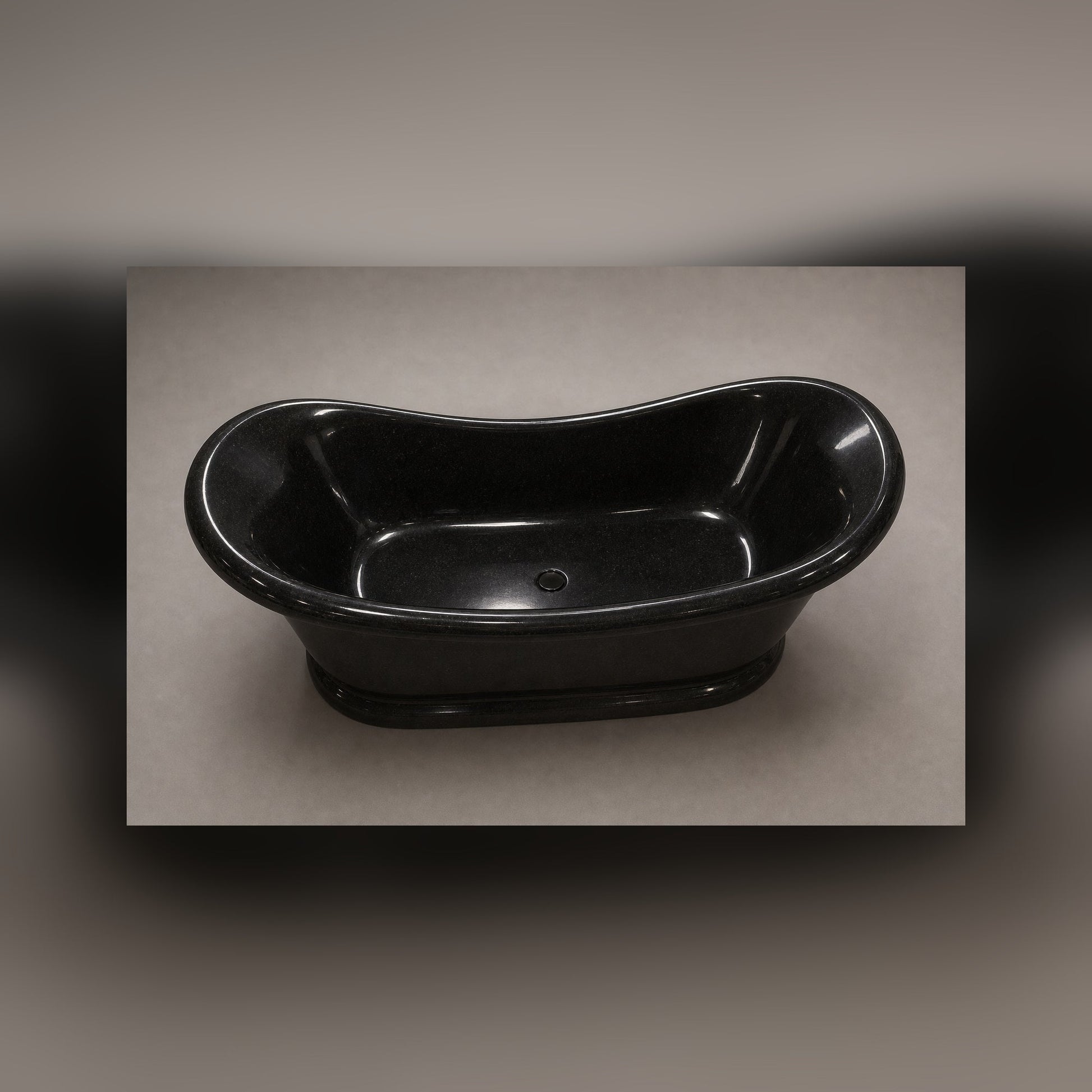 Vallora Absolute Black Granite bathtub, top interior view with drain
