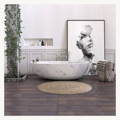 Yaris Carrara White Marble bathtub in a refined luxury bathroom scene
