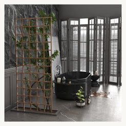 Yetta Portoro Black Marble bathtub in a refined dark luxury bathroom scene