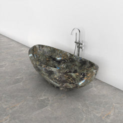 Yuna Celestia Blue Quartzite bathtub, exact-source top interior view showing basin, stone texture and drain