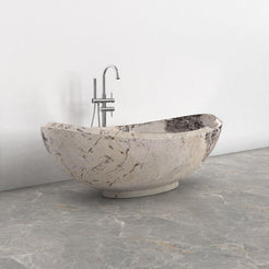 Yuna Pandora Blanc Quartzite soaking bathtub, exact-source top interior and centered drain view