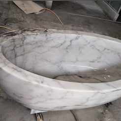 Actual Aurelia BT-038A Ivory Cloud Marble bathtub, polished interior, rounded rim and natural veining detail